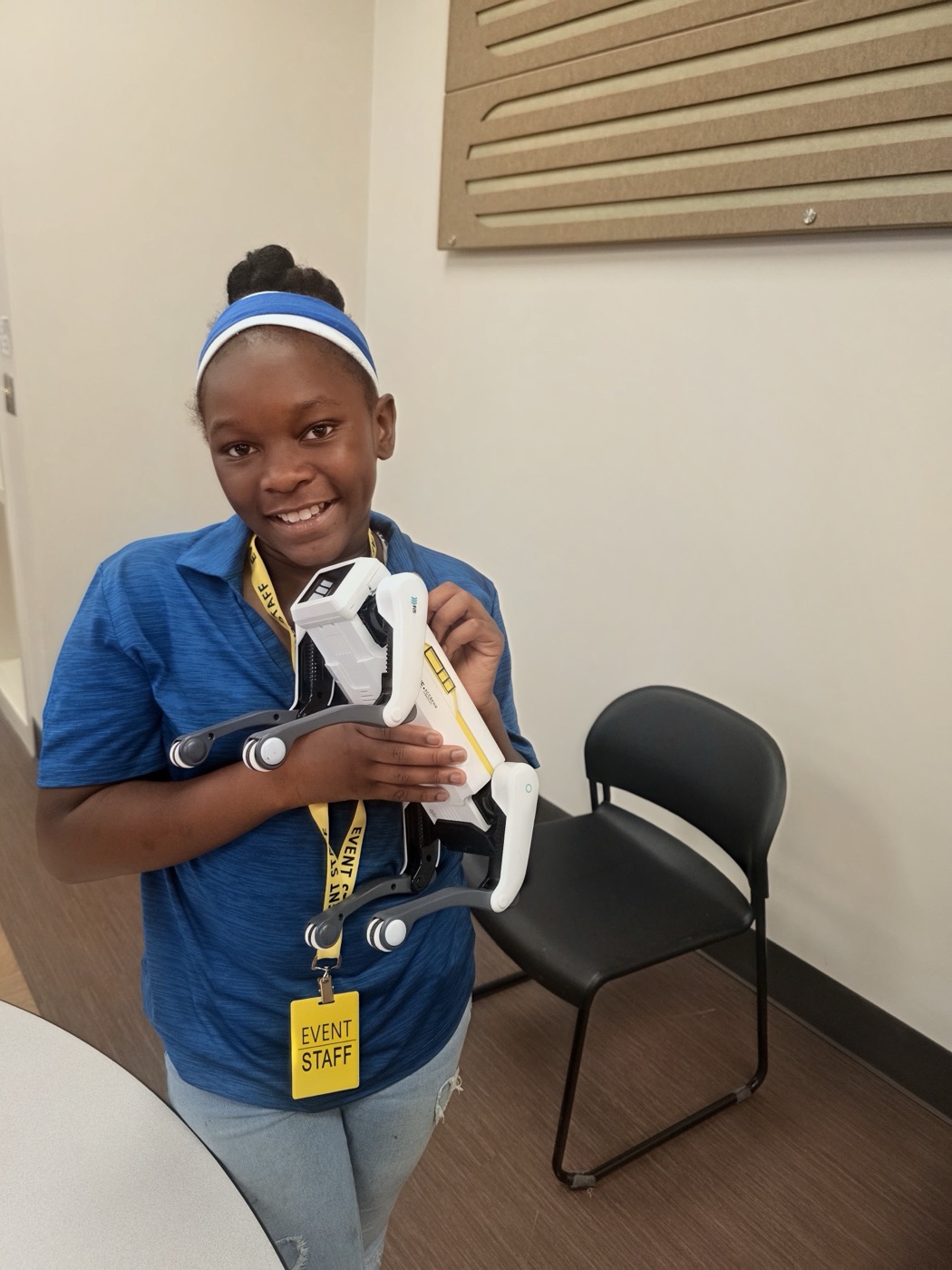 Young student holding a drone